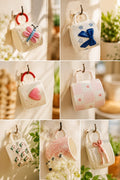 White ceramic handbag mugs with butterfly, bow, heart, floral and hedgehog designs